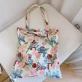 Detalle del bolso de lona con estampados de rosas e iris y asa de tela reforzada - Grandes Flores Rojo Rosa Azul