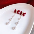 Detail of red velvet bow earrings with cascading white pearl tassels for a festive look - Velvet Bow Triple Pearl Tassel Style (38#)