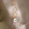 Golden moon and star suncatcher with crystal prism creating colorful rainbow reflections - US 15