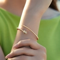 Elegant gold-plated snake-shaped open bracelet with crystal eyes on female wrist - Snake Round Bead Style (KB0538-3) / Gold