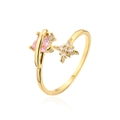 Detail eines 18K vergoldeten Rings mit rosa Zirkon und Sternen-Akzenten - Einstellbar Offen / 18K Vergoldet/Rosa Herz Zirkonia