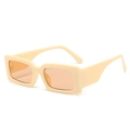 Occhiali da sole retrò con montatura spessa giallo crema e lenti arancione chiaro - Montatura Beige Lenti Champagne