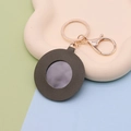 Dark green leather heart-shaped keychain with integrated mirror and golden metal clasp - Round Army Green