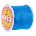 Spool of bright blue size 72 nylon jewelry cord for DIY bracelet and necklace weaving - Lake Blue