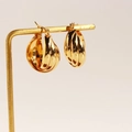 Minimalist multi-layered gold hoop earrings with intertwined geometric circle design - Gold