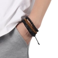Set di tre bracciali da uomo con perline nere, legno e pelle intrecciata nera - Set di 3 Pezzi Nero / Nero
