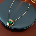 Golden snake chain necklace featuring a vintage square green gemstone pendant - Green Necklace