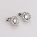 Classic silver-tone halo stud earrings with brilliant round cubic zirconia center stones - Stud Earrings / Steel