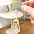 Transparent cat-shaped capsule charm in yellow finish with secure wire ring keychain - New Box - Orange Cat