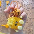 Cute cartoon French fries keychain in bright yellow with matching bell and ring - Glowing Fries-Yellow