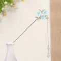 Detail of golden hair pin with light blue flowers, pearls and long tassel pendant - Small Teal Cherry Blossom