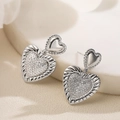Silver double heart drop earrings with sparkling cubic zirconia on textured fabric - Silver (45336)