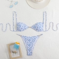 Close-up of floral bikini set with luxury pearl accents and gold metal hardware details - S / White with Blue Flowers
