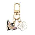 Portachiavi in lega con farfalla in smalto viola e ciondolo a forma di fiore di ciliegio - Farfalla Viola + Fiore di Ciliegio Bianco