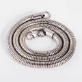 Detailed view of stainless steel round snake bone chain with lobster clasp on white background - 6.5MM / Soft Snake/welded Snake Head / 40CM