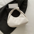 Chic white woven hobo bag with signature knotted handle for stylish winter commuting - White