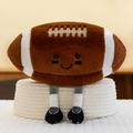 Peluche de football américain mignonne avec jambes et baskets sur tapis blanc - Ballon de rugby / 27cm