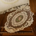 Oval ivory lace placemat with floral embroidery on vintage wooden chair backdrop - Apricot