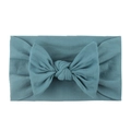 Detail of teal nylon headband showing soft knitted texture and delicate bow for infants - Navy Blue