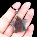 Pentagram star pendant in green and reddish-brown mottled natural stone with black cord - 30mm Indian Agate