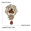 Elegant luxury flower brooch with amber crystal petals and multicolor rhinestones - Brown