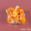 Artificial Danish pastry model with orange fruit jam and white glaze topping 7.5cm - Orange