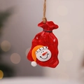 Detail of Let It Snow resin ornament with a snowman face and a rustic jute rope - Style 8 (Snowman Red Gift Bag)