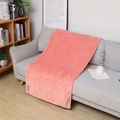 Pink coral fleece blanket with vertical stripe texture on a gray home sofa - Striped Coral Pink / 75*120cm