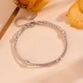 Detail of silver double-layered stainless steel bracelet with snake and rope chain style - Steel Oval Beads