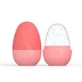Pink egg-shaped silicone facial ice roller and massage mold with wave texture detail - New Egg Pink