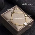 Gold stainless steel snake chain bracelet with heart charms and white shell inlay - White Shell Bracelet