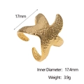 Detalle del anillo de estrella de mar dorada mostrando el diámetro y la textura fina - Estilo de Estrella de Mar Abierta / Dorado