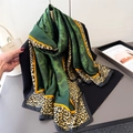 Deep green silk scarf with floral center and leopard print borders over a black jacket - Green (XD18-1)
