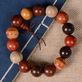 Multi-colored 18mm redwood bead bracelet featuring mixed tropical hardwoods and brown cord - Multicolor (15mm*15 Beads Regular)