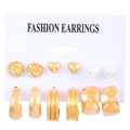 Detail of 6-pair gold earring set with faux pearls and textured hoops on display card - 6 Pairs Set - Gold Pearl Heart (3215) / Gold