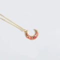 Golden crescent moon necklace with pink enamel and white crystals on white background - Rose Red