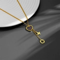 Gouden ketting van titaniumstaal met minimalistische hart- en klavervormige hangers - Goud