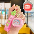 Pink Doraemon TV-shaped glowing keychain with silicone hand strap and MENG branding - Mini Glowing TV-Robot Cat