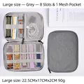 Grey portable watch band organizer with 8 elastic slots and zipper mesh pocket - Medium Grey (22.5x17x2cm)