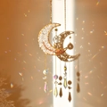 Macro view of gold moon dreamcatcher with crystal prisms creating rainbow light spots - Synthetic Clear Quartz