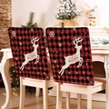 Detail of red and black buffalo plaid Christmas chair covers with reindeer and snowflake motifs - Red Black Plaid White Reindeer Snowflake (YT01-19)