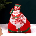 Knitted Christmas gift bag in Santa outfit style with red and green festive colors - Santa Claus Knit Bag with Pin Card (Small)
