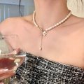 Elegant white freshwater pearl necklace featuring a gold camellia flower pendant - Style AC-007-Glass Shell Pearl Camellia Necklace