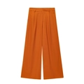Détail du pantalon en lin orange à taille haute avec jambes larges et plis - XS / Pantalon Orange