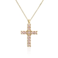 Macro view of gold-plated cross pendant featuring pink square-cut zircon stones - Pink Zirconia