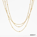 Collier multicouche en acier inoxydable doré avec perles délicates et chaînes serpent - Collier Multicouche à Perles Dorées (KDD517)