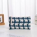 Large blue canvas makeup bag featuring an all-over white polar bear pattern with zipper - Polar Bear (No Label) / Large