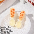 Detailed macro view of 1.9cm miniature resin bread spoon charms for DIY crafts - Spoon