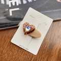 Brown leopard print heart hair clip with a rainbow gemstone on a beige matte base - Leopard Print