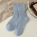 Sky blue mélange wool socks with ribbed cuffs in a cozy aesthetic home setting - Light Blue